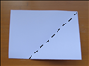 The folded edge should be at the bottom.
Bring the right bottom corner up and align the right edge with the top.