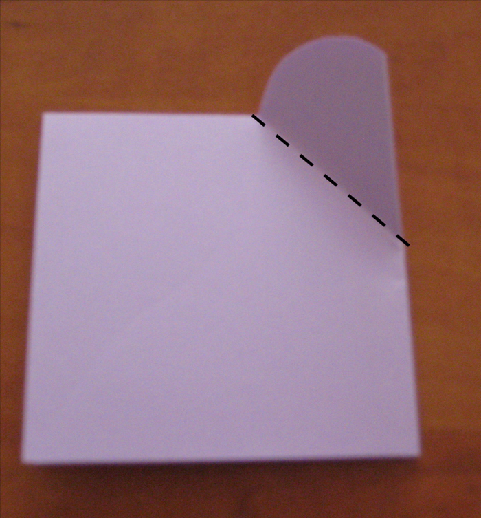Turn the card over and fold along the crease to sharpen it