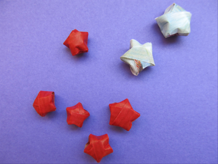 To make lucky stars you will need strips of paper
½ inch wide by 11 inches long

Larger or small stars can be made the ratio is about 1 to 13 
You may need to add more to the length for thicker strips.
