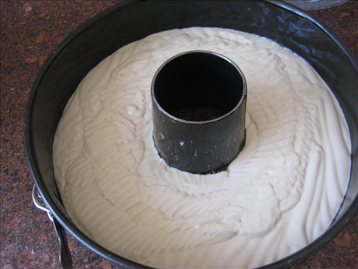 Pour most of the batter into a greased  tube cake pan – it is the pan with a hole in the middle