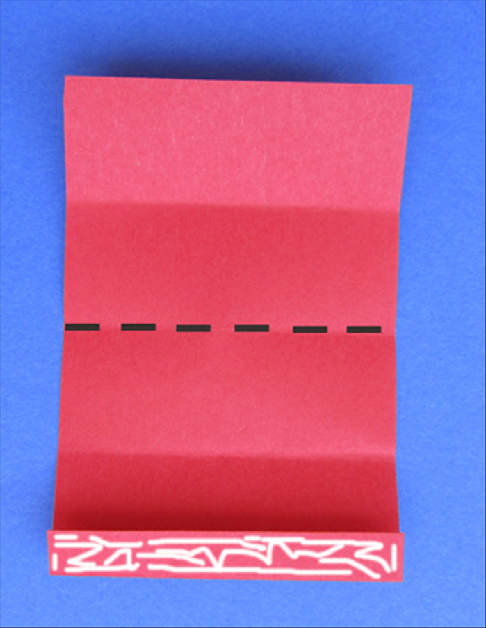 Put glue on the flap and fold the paper in half