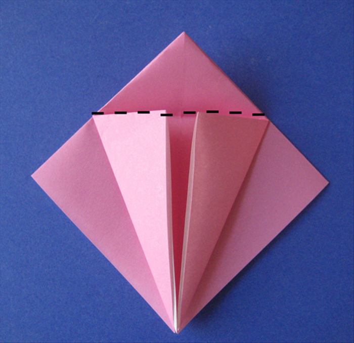 Fold the top point down along the 2 flaps you just made. Unfold

Flip your paper over and repeat steps 2 and 3 on the other side.

