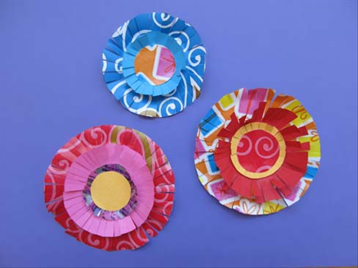 Have fun experimenting with different papers, different slit widths and the number of circles you put on top of each other!