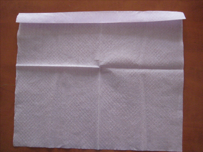 Make a small fold at one end.