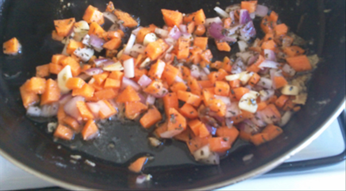 <p> Put the onions, garlic, carrots and basil in oil left in frying pan.</p> 
<p> Fry them until lightly browned.</p>