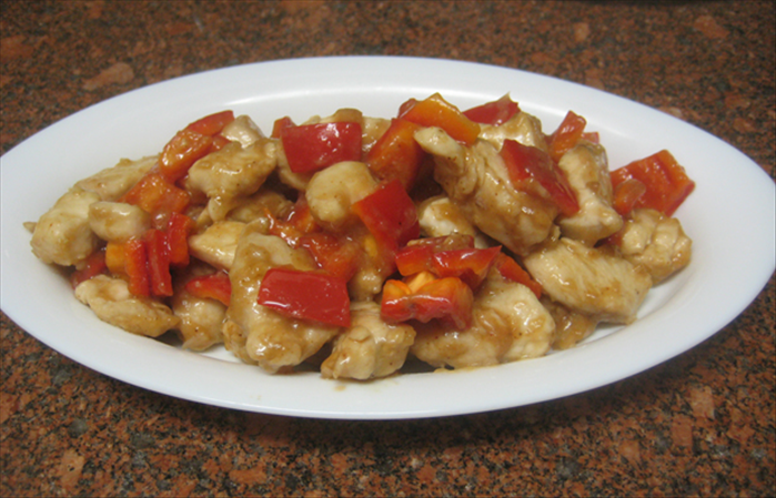 Ingredients:
2 pounds chicken cut into cubes – chicken breast or thigh meat
1 large garlic clove crushed
1 large red pepper cut into cubes
1 red hot pepper cut into small pieces - more or less depending on how hot the peppers are and how hot you like it
3 tablespoons oil

For the marinade:
1 tablespoon cornstarch
1 tablespoon soy sauce
2 tablespoons water

For cooking sauce:  
1 teaspoon sugar
1 teaspoon cornstarch
1 tablespoon wine
1 tablespoon water
 1 teaspoon vinegar
