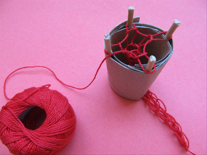Your knitting will begin to show through the bottom of the tube.