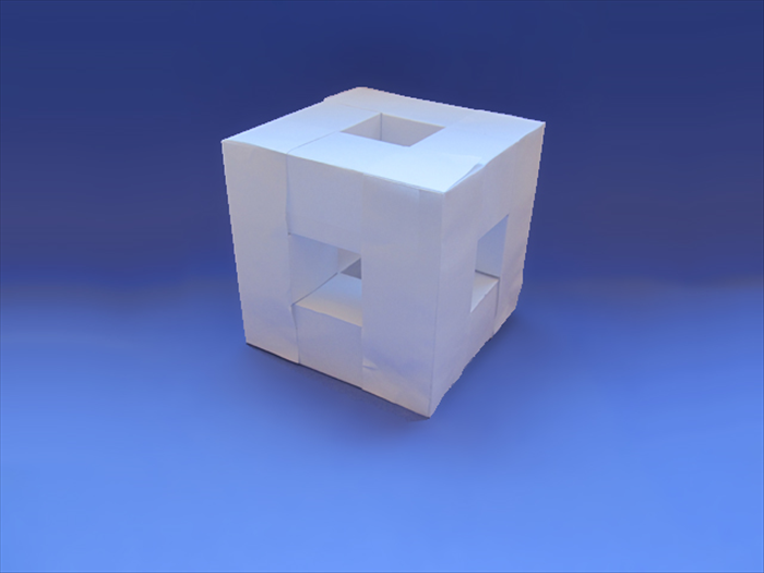 <p> Align the corners and glue them in place.</p> 
<p> Enjoy your 3D cube frame!</p>