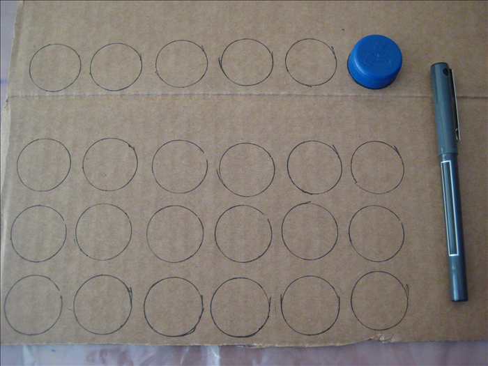 Trace 24 circles with the bottle cap.
*You can make a few extra in case any pieces are lost
