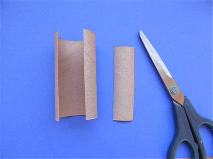 Cut a 1 inch slice lengthwise from the toilet paper roll 