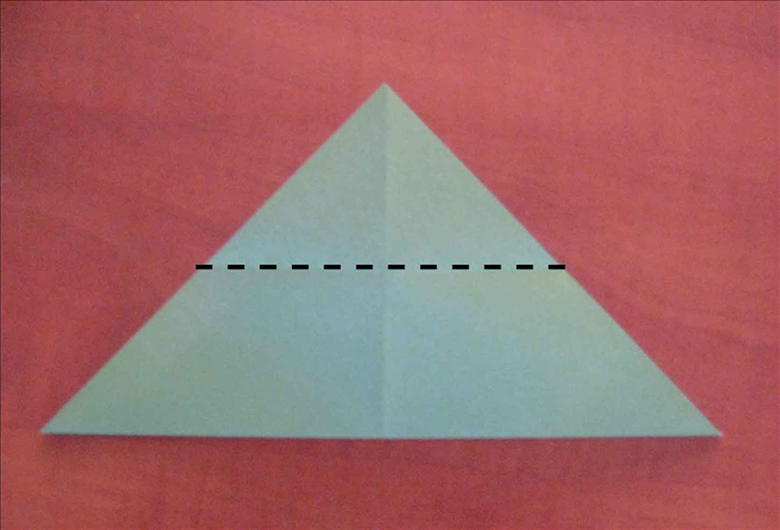 Place the paper so the the long edge is at the bottom.

Fold the top layer down to the bottom edge.