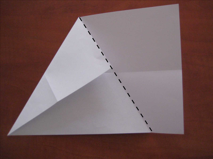 Fold the right side of the paper over the edge of the fold you just made.