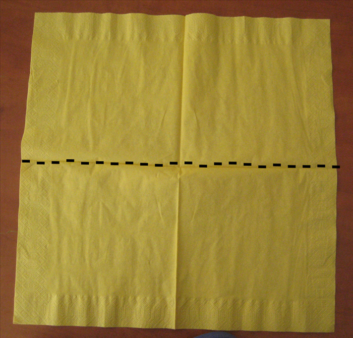 Open up your napkin completely
Bring the bottom edge up to the top edge to fold it in half.