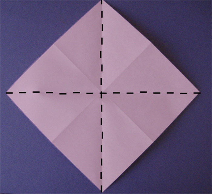 Flip the paper over to the back side, with the points at the top, bottom and sides.

Fold in half horizontally. Unfold
Fold in half vertically. Unfold