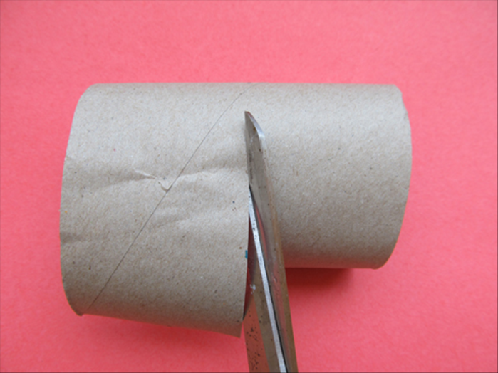 Use the marks as a guide to cut the roll in half