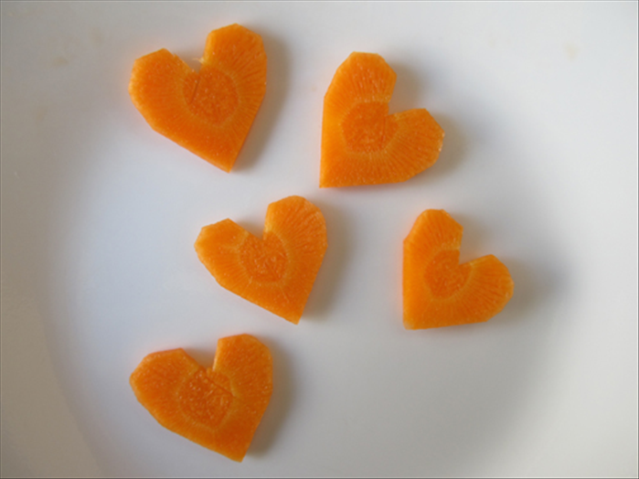 Your heart shaped carrot slices are ready to decorate your food.
Bon Appetite!
