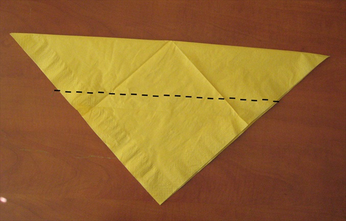 Fold the bottom tip up so that it slightly overlaps the top edge.
