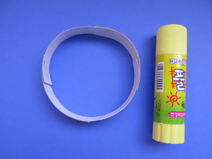 If you are making a napkin ring glue the ends of one slice together
If you are making a bracelet glue 2 together to make a ring big enough to slide over your hand.
