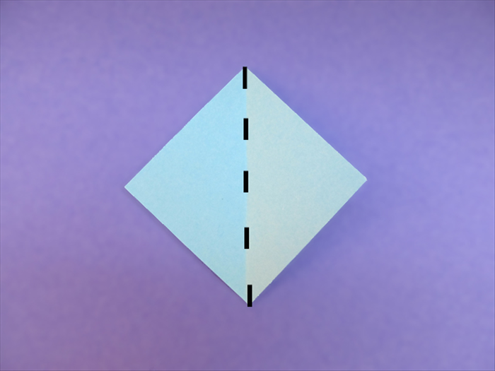 <p> Fold the scrap paper square in half diagonally</p> 
<p>  </p>