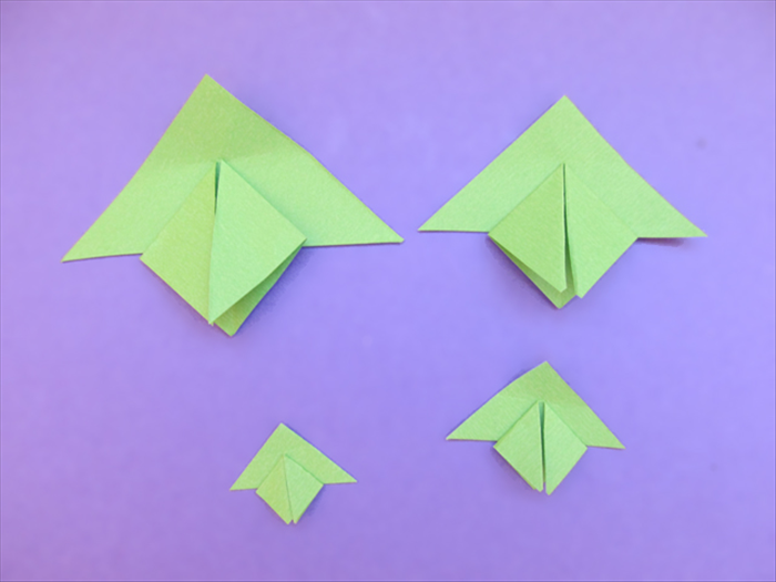 Repeat for all the triangles. Glue the folded triangles to the matching size of the unfolded triangle.