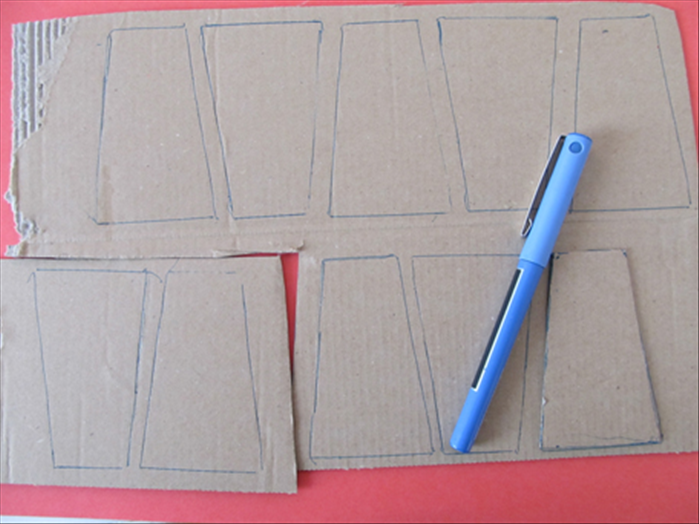 Trace the template on cardboard 12 times for a child’s necklace
And 16 times for an adult’s necklace
