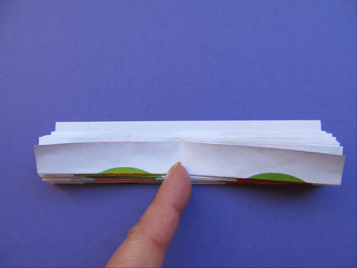 Continue folding the paper accordion style until you get to the top