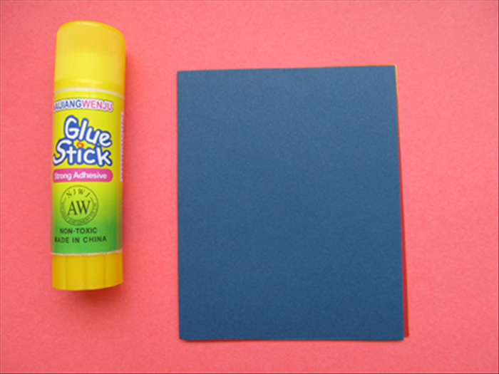 Use only a small line of glue at the top of each colored paper to hold them together.