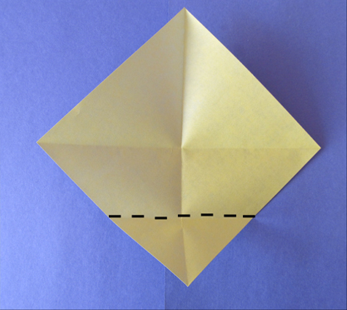 Fold the bottom point up to the center.