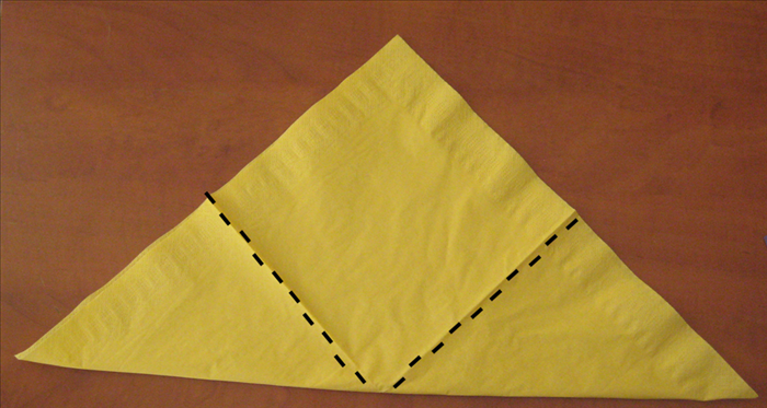 Fold the 2 bottom points up to the top point.