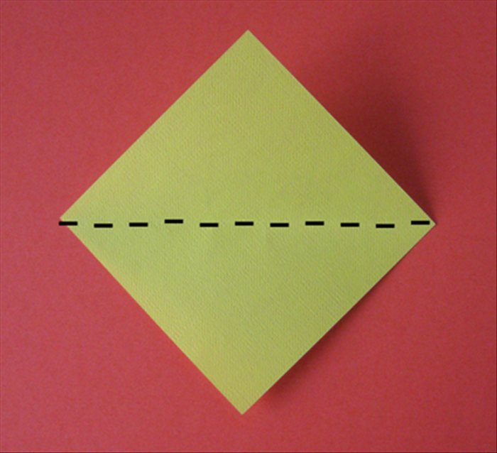 Fold the bottom point up to the top point.