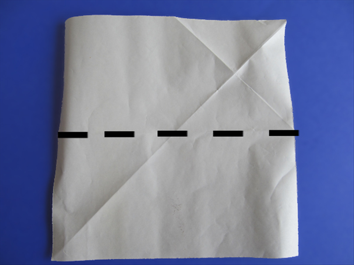 <p> Flip the paper to the back side and fold it in half along the crease.</p> 
<p>  </p>