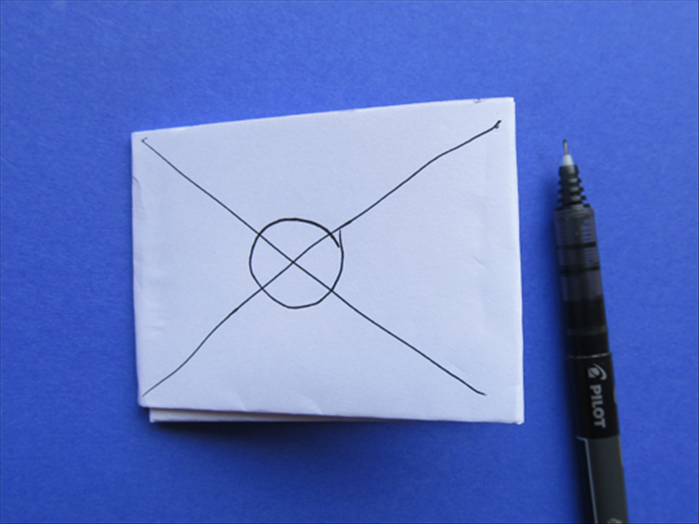 Draw 2 lines from the corners as shown
Draw a circle in the center
