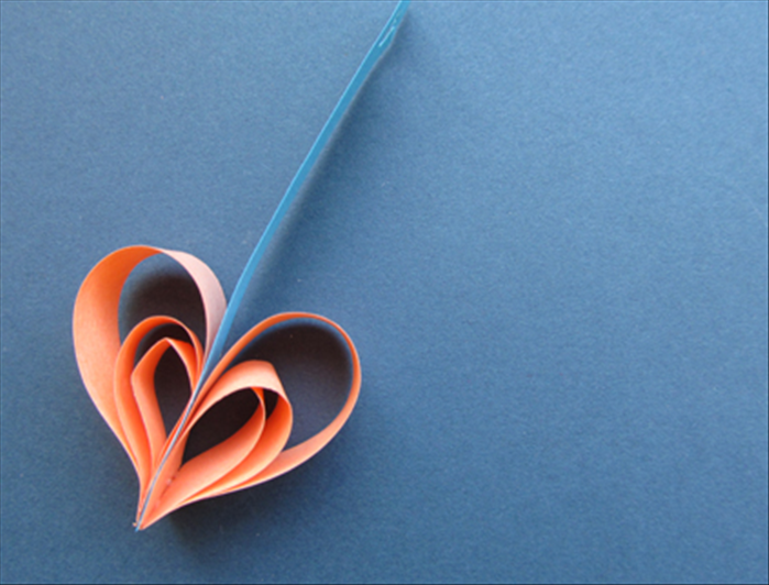 Materials: 
Paper
Scissors
Paper glue
Hole puncher
