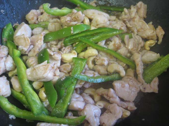 Add the cashews and wine and sugar vinegar mixture
Stir fry 2 minutes
