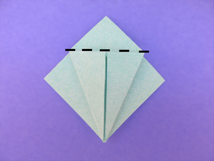 <p> Fold the top down along the top edges of the flaps you just made.</p>  
<p>  </p>