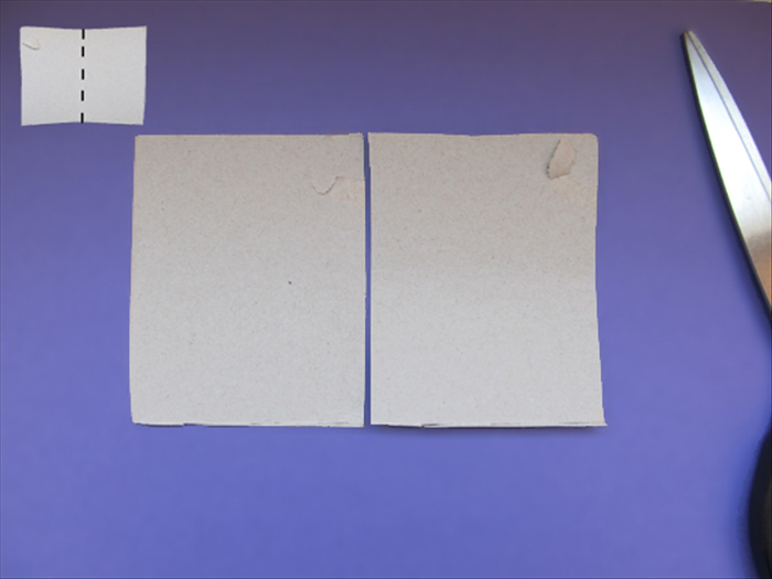 <p> Fold a rectangle of cardboard in half.</p> 
<p> Cut along the crease.</p> 
<p>  </p>