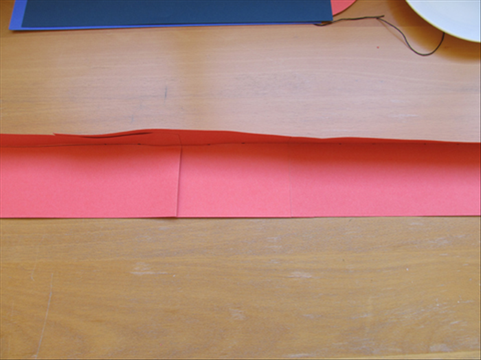 Make a sharp neat crease along the line you drew.
Unfold