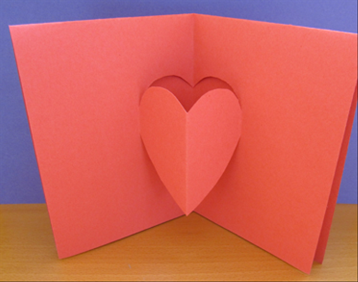 Result. The background folds in and the heart folds out.
Close the card, press it down to crease it sharply
and your popup heart card is ready to decorate and for your message.