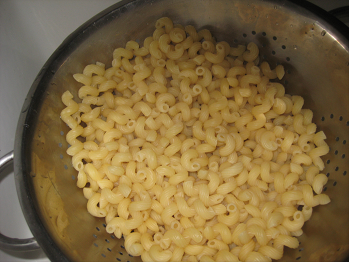 Boil the pasta until just cooked and not mushy
Drain it in a strainer


