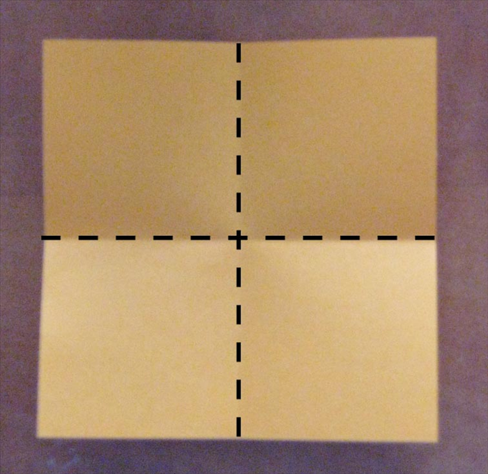 Fold the second square paper in half horizontally and half again vertically to get the crease lines for ¼. Cut out one quarter piece.